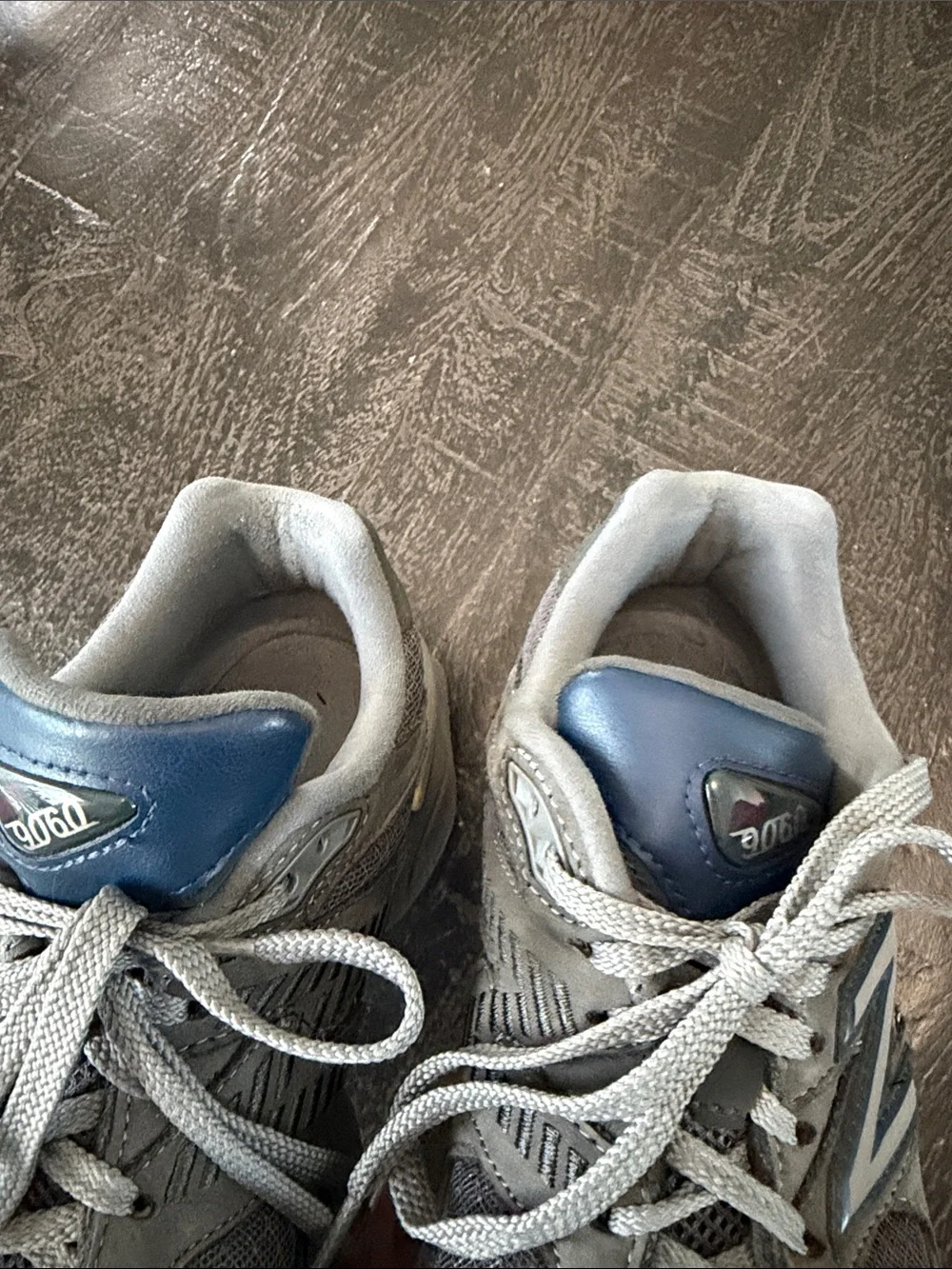 New Balance 9060 Gray Sneakers with Blue Logo Accents